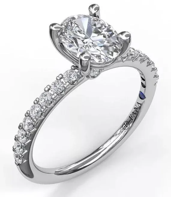 Classic Single Row Engagement Ring with an Oval Center Diamond